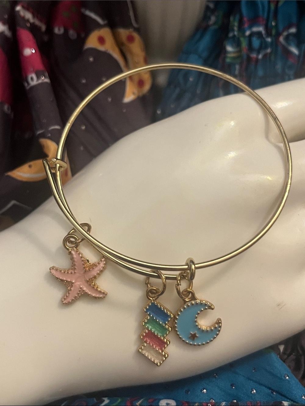 Kids Gold-Tone Bangle Bracelet with Pink Starfish, Blue Moon & multi Charm 27